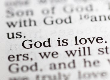 Biblical text. God is love. Christian concept