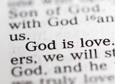 Biblical text. God is love. Christian concept